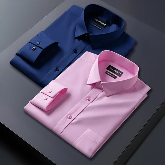 Folded blue and pink dress shirts on a gray surface