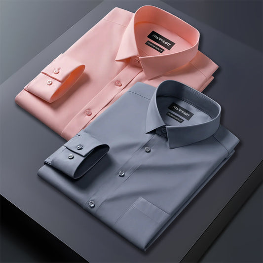 Pink and gray dress shirts on a dark surface with a brand label visible.